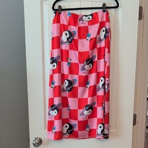 Dressed in LALA Pink and Red Checkered Midi Skirt with Planet Motifs